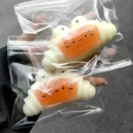 caramel croissant silicone squeezable stress relief toy banner 3