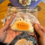 caramel croissant silicone squeezable stress relief toy banner 6