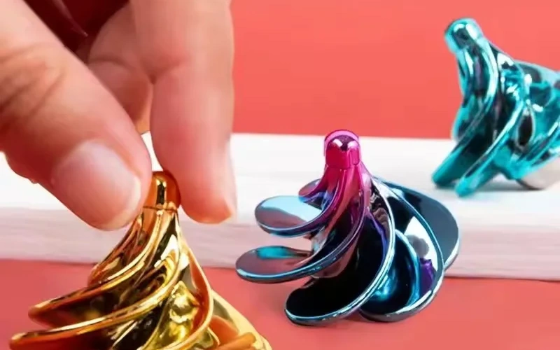 kinetic spinning desk toy adult stress relief fidget feature banner 3