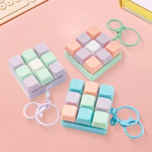 macaron keyboard fidget toy keychain stress relief banner 2