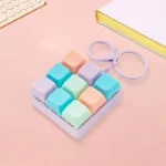 macaron keyboard fidget toy keychain stress relief banner 4
