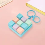 macaron keyboard fidget toy keychain stress relief banner 5