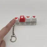mini mechanical keyboard keychain fidget toy for girls banner 4