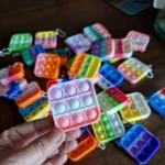 mini party favors pop fidget keychain banner 2